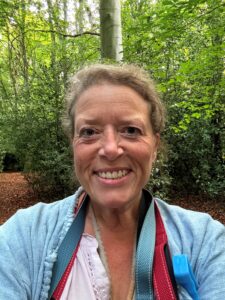 Alison Biggs walking in woods